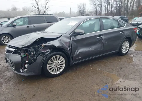 2014 Toyota Avalon Hybrid Limited z USA, uszkodzony, nr VIN 4T1BD1EB7EU029584